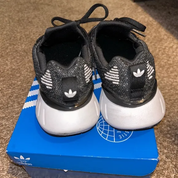 Adidas Black and White Sneakers with Athletic Style