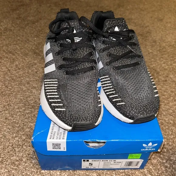 Adidas Black and White Sneakers with Athletic Style