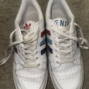 Adidas White and Red Sneakers with Classic Design