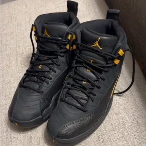Air Jordan 12 Retro Mid Black Taxi Sneakers