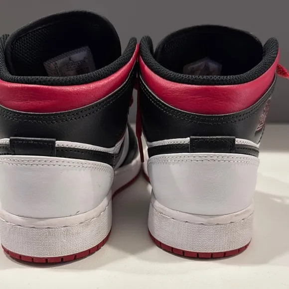 Air Jordan Black and White Sneakers with Red Accents