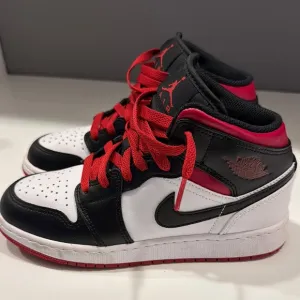 Air Jordan Black and White Sneakers with Red Accents