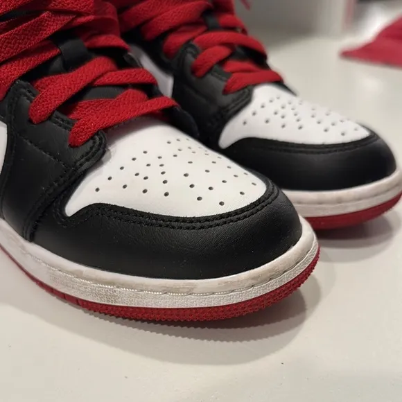 Air Jordan Black and White Sneakers with Red Accents