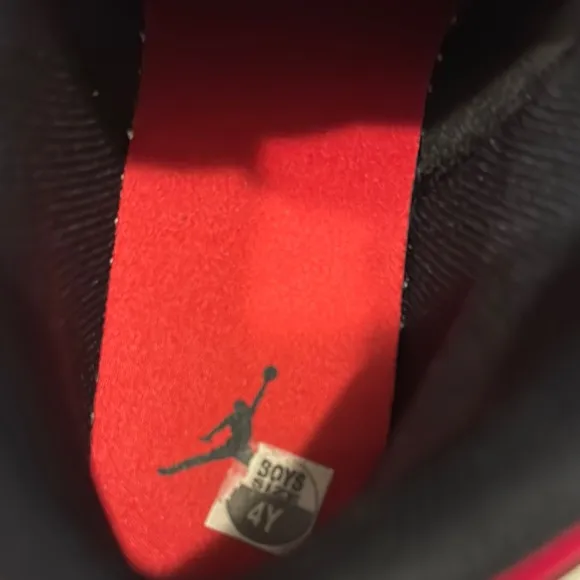 Air Jordan Black and White Sneakers with Red Accents