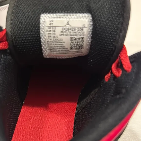 Air Jordan Black and White Sneakers with Red Accents