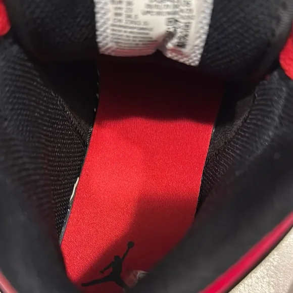 Air Jordan Black and White Sneakers with Red Accents