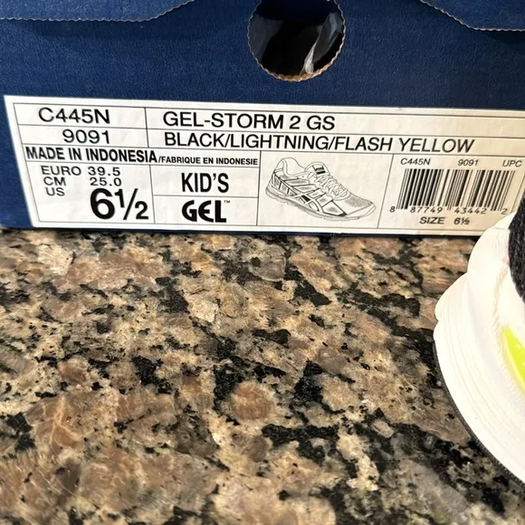 ASICS gel storm black lighting flash yellow kids sneakers NIB6.5