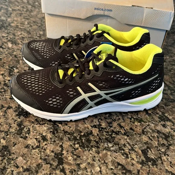ASICS gel storm black lighting flash yellow kids sneakers NIB6.5