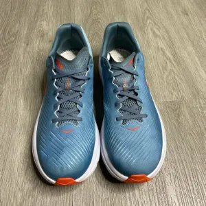 Blue and Orange Athletic Shoes