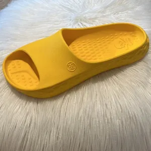 G/FORE yellow slip on shoes