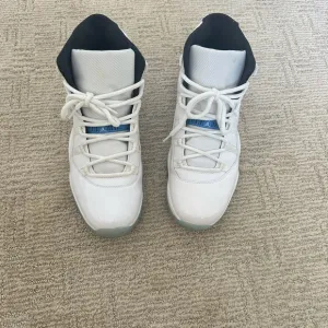 Jordan White and Blue High-Top Athletic Shoes