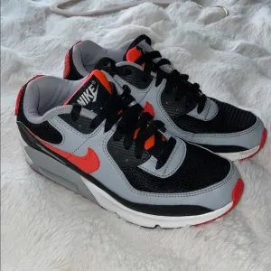 Kids Nike Black and Red Air Max Sneakers with Sporty Design