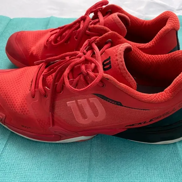 lot of gently used 10.5 pickle ball sneakers .