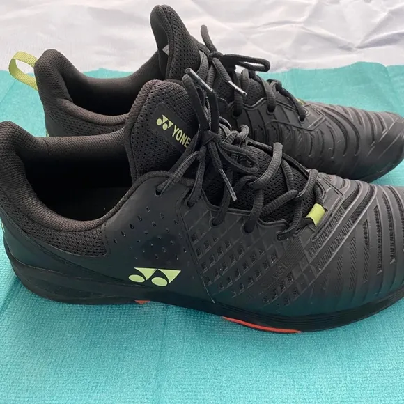lot of gently used 10.5 pickle ball sneakers .