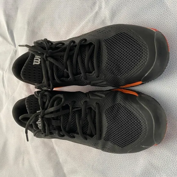lot of gently used 10.5 pickle ball sneakers .