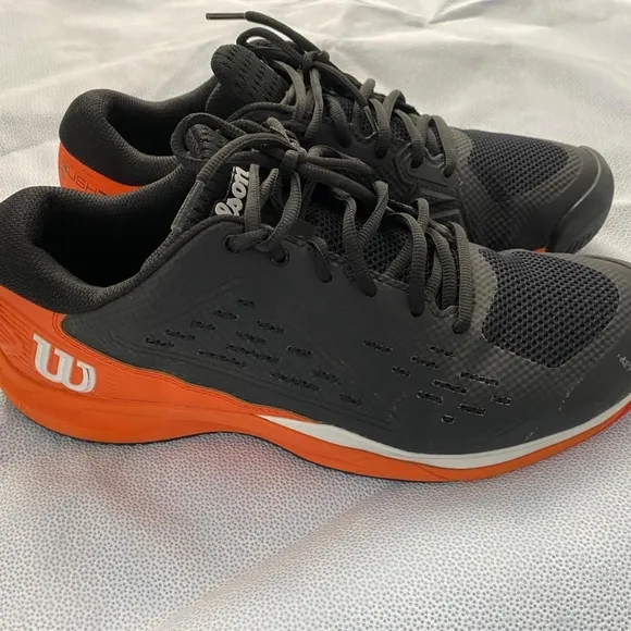 lot of gently used 10.5 pickle ball sneakers .