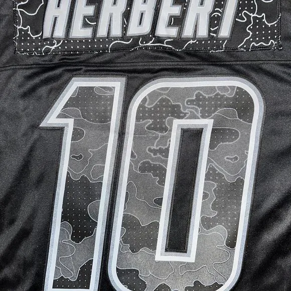 Men's Nike Justin Herbert Black Los Angeles Chargers RFLCTV Limited Jersey