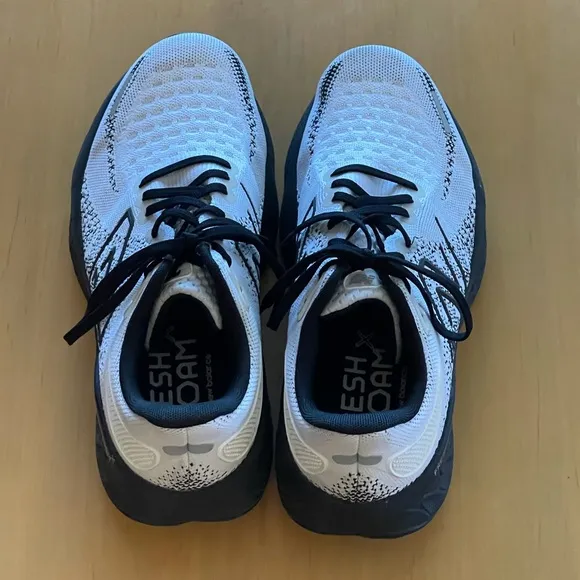 NEW BALANCE- White and Black Athletic Shoes