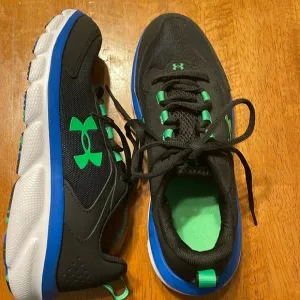 NEW Size: 6Y Under Armour Kids Assert sneakers, black, green, blue, and white