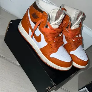 Nike Air Jordan High-Top Sneakers - Orange and White