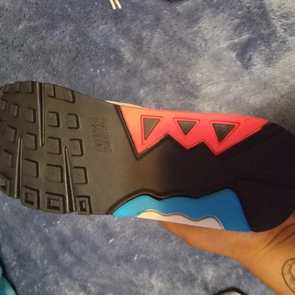 Nike Air Sneakers with Blue and Pink Accents
