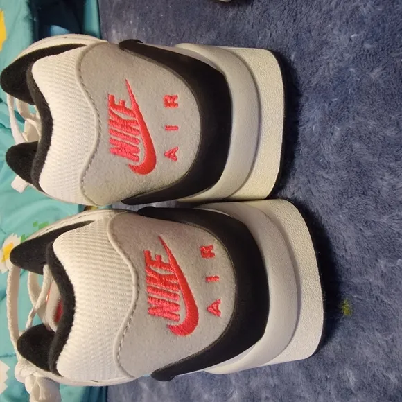 Nike Air Sneakers with Blue and Pink Accents