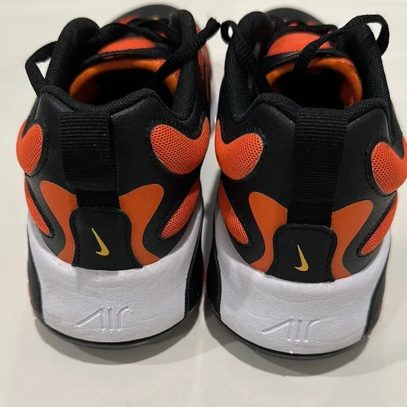 Nike Black and Orange Sneakers with Bold Design