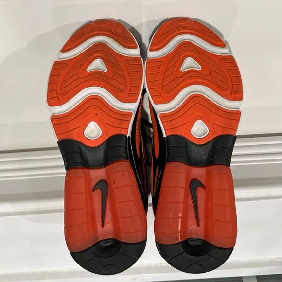 Nike Black and Orange Sneakers with Bold Design