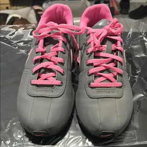 Nike Shox rare pink and gray. The size is 7Y
