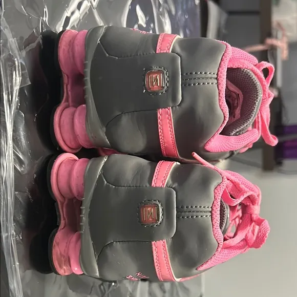 Nike Shox rare pink and gray. The size is 7Y