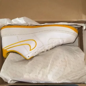 Nike White and Yellow Athletic Sneakers