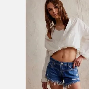 NWT Free People We The Free Westwood Mid Rise High Low Jean Shorts