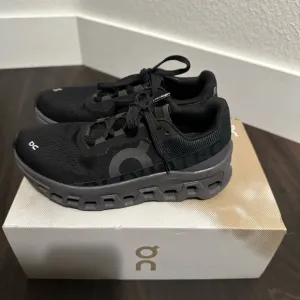 On Running Black and Gray Sneakers