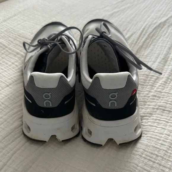 On Running White and Black Sneakers