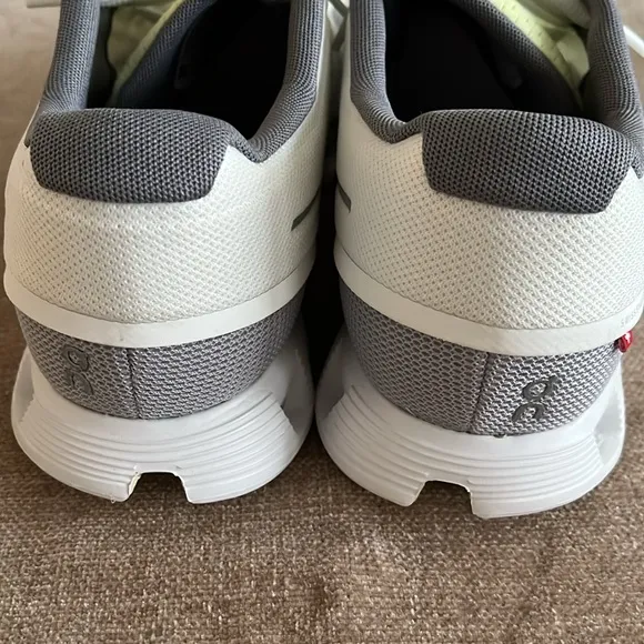 On Running White and Gray Sneakers