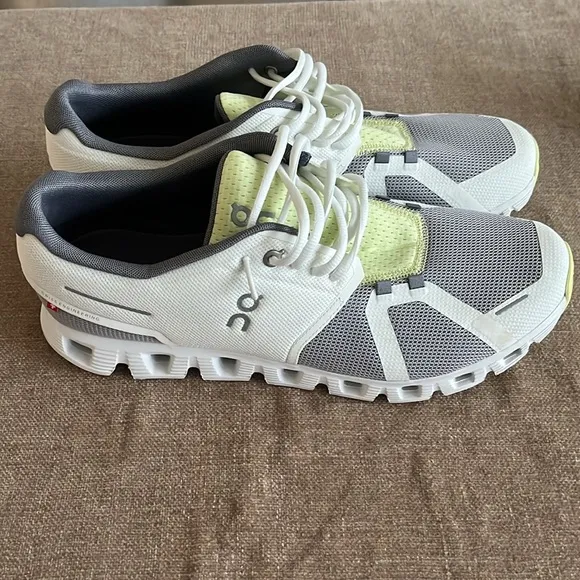 On Running White and Gray Sneakers