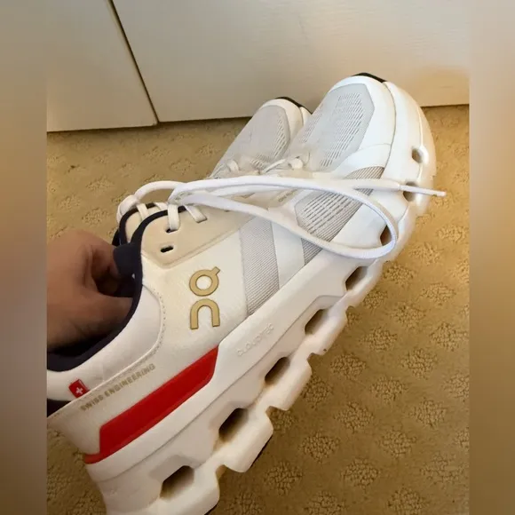 On Running White and Red Sneakers