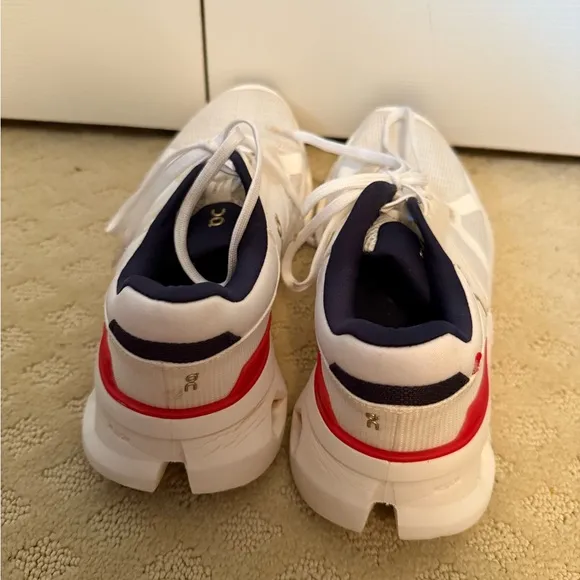 On Running White and Red Sneakers