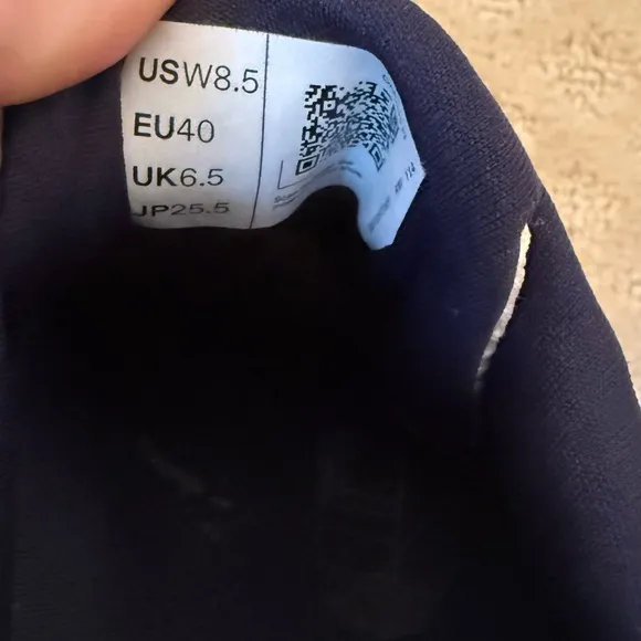 On Running White and Red Sneakers