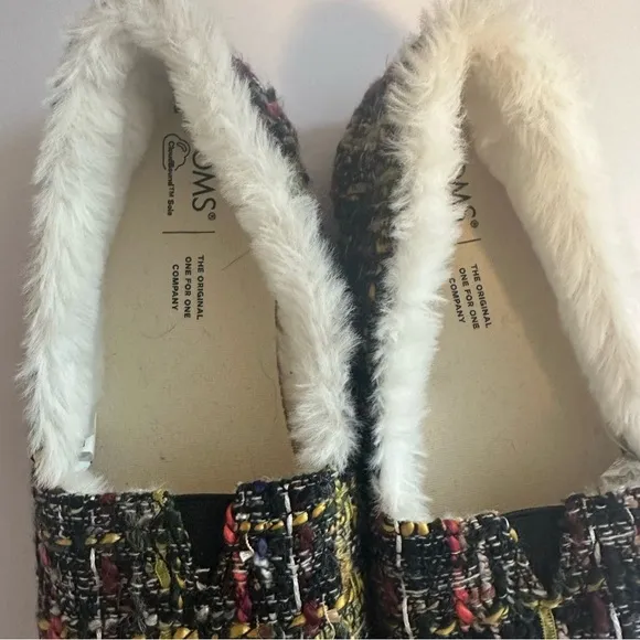 Tom’s woman’s alpargara slip on Sherpa lined shoes.