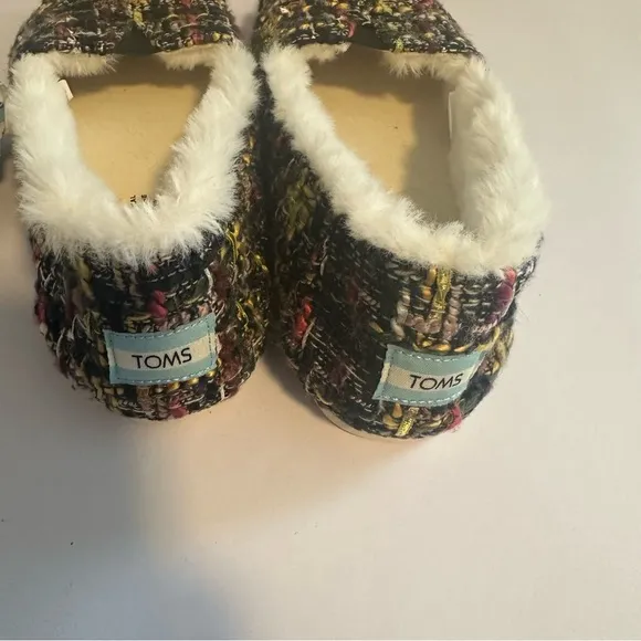 Tom’s woman’s alpargara slip on Sherpa lined shoes.