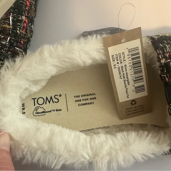 Tom’s woman’s alpargara slip on Sherpa lined shoes.