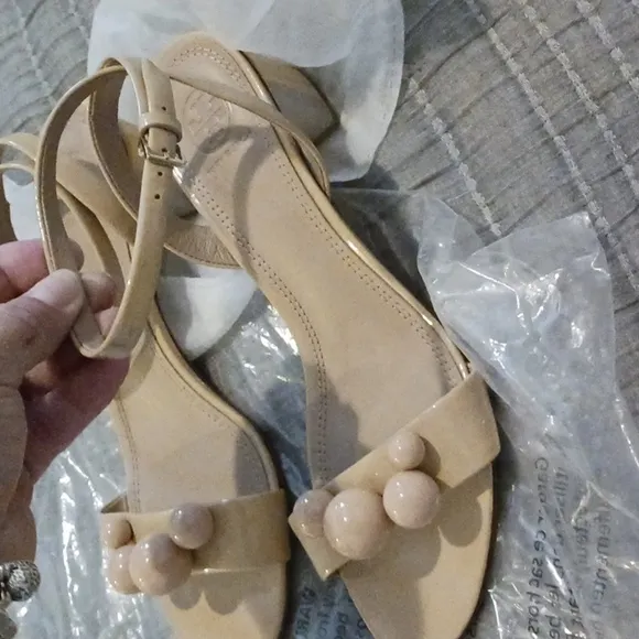Tory Burch disco sandals.