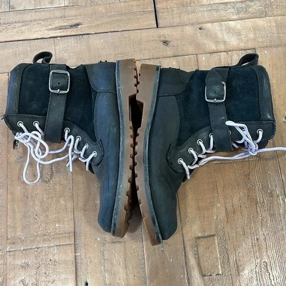 Ugg Koren black leather buckle strap lug sole boots