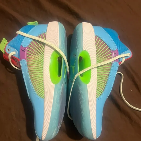 Vibrant Blue and Green Athletic Sneakers with Modern Design Air Jordan 35 Nike