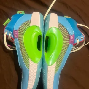 Vibrant Blue and Green Athletic Sneakers with Modern Design Air Jordan 35 Nike