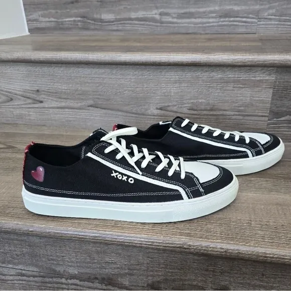 We are nothing new black and white casual tennis shoes Men's size 12.5