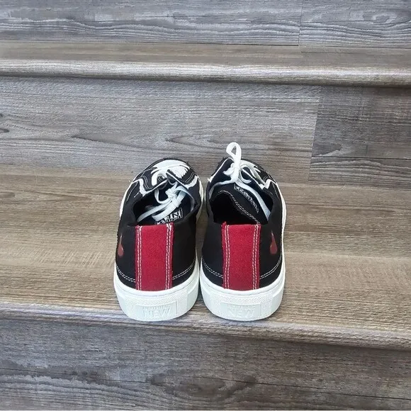 We are nothing new black and white casual tennis shoes Men's size 12.5